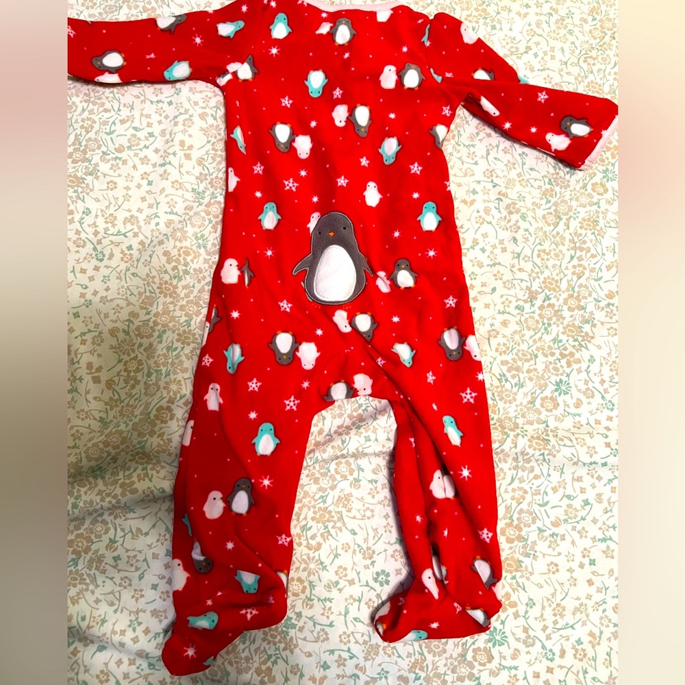 6-9 months penguin fleece footie pjs. $5.
